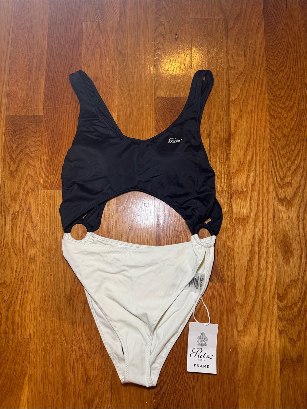 NWT FRAME x Ritz Paris WhiteTwo-Tone White/Black Swimsuit with Knot Accent